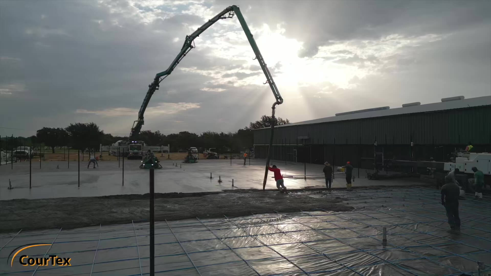 CourTex Construction crew building a basketball court in Austin, Texas.