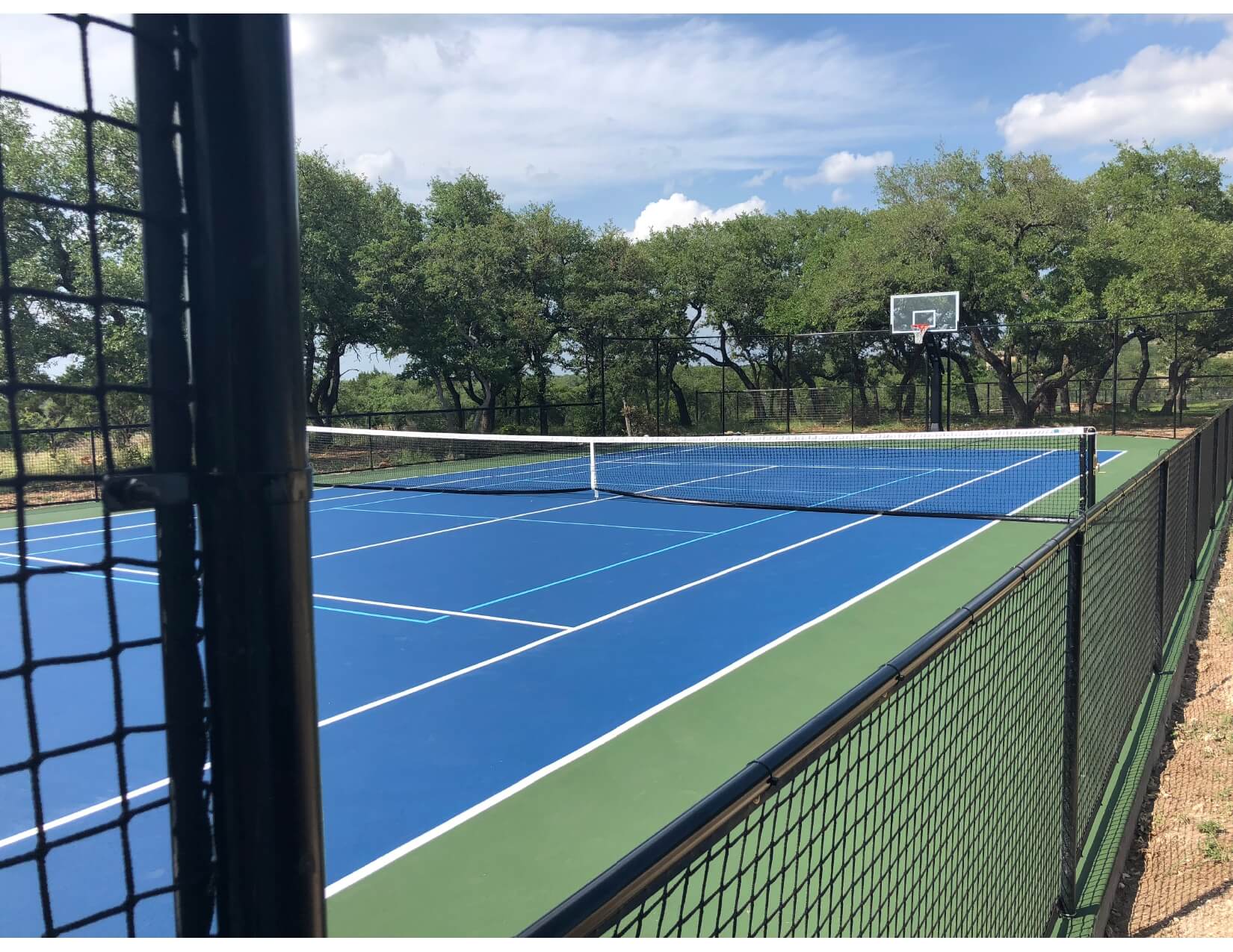 Three-in-one court with basketball, tennis, and pickleball for ultimate fun and enjoyment.