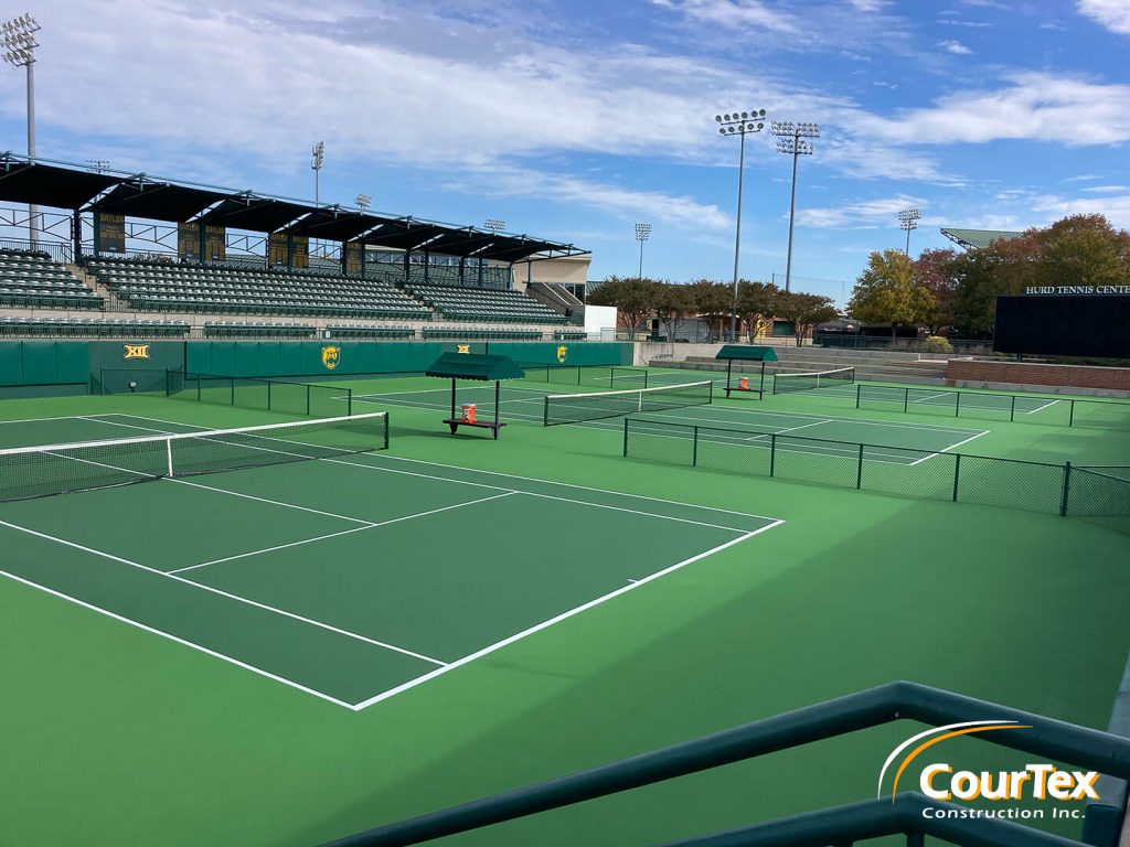 A modern sports facility with dedicated pickleball courts and a professional training area.
