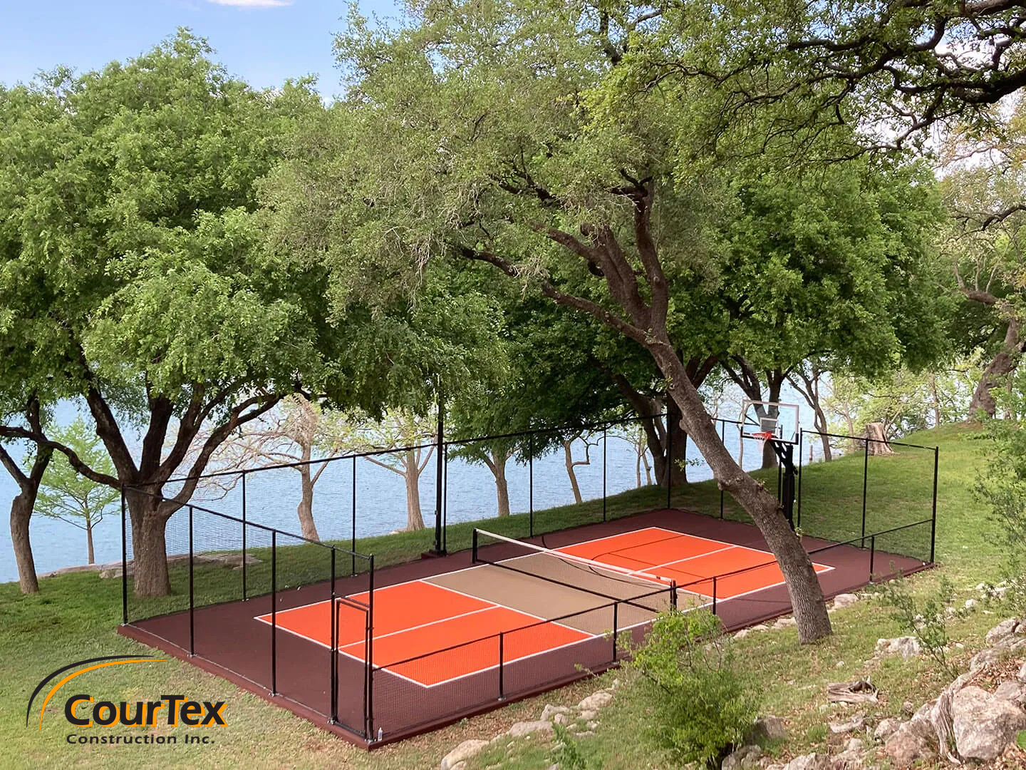 Custom-built pickleball court at a vacation property, offering leisure and fitness in one space.